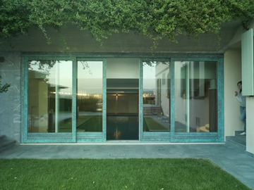 ALU 90 BRONZE - Lift and slide wood-bronze patio door by CARMINATI SERRAMENTI - view 2